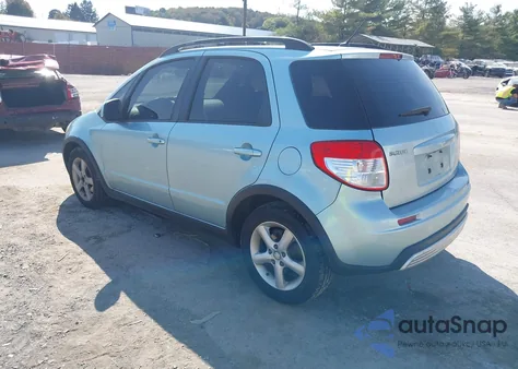 2009 Suzuki Sx4 Technology z USA, uszkodzony, nr VIN JS2YB413196201922